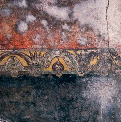Detail van de muur